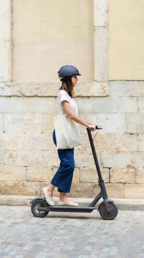 young-woman-using-eco-scooter